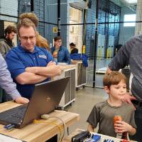 Faculty and families wait for the races to begin